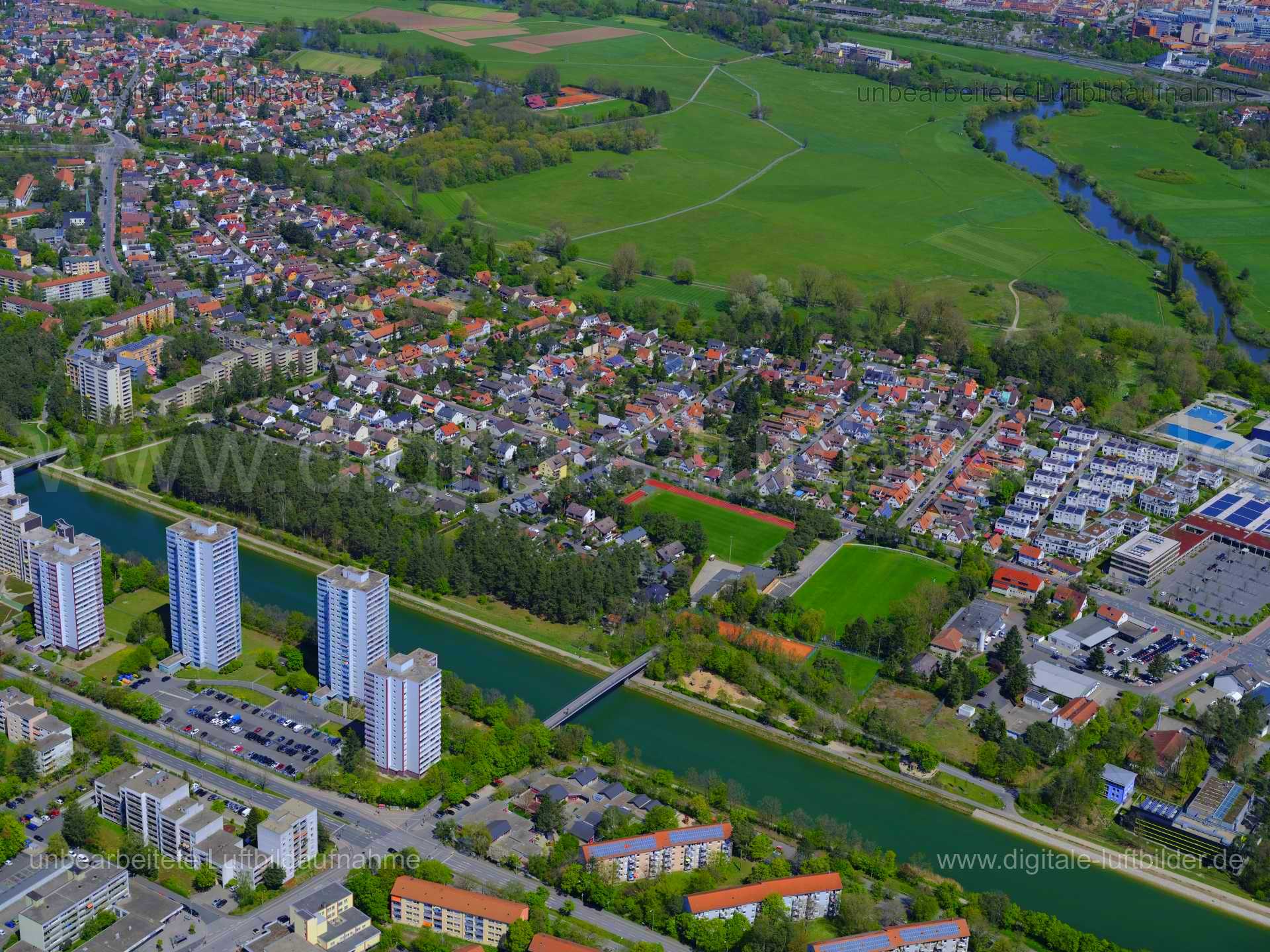 Titel: Erlangen, Bildnummer: f427370, Ort / Stadt: Erlangen, (Land)Kreis: kreisfreie Stadt Erlangen, Regierungsbezirk: Mittelfranken, Bundesland: Bayern, Aufnahmedatum: 09.05.2021, Schlagwörter: Luftbild, Luftbilder, Luftbildfotografie, Luftaufnahme, Luftbildaufnahme, Luftfoto, Vogelperspektive, Vogelansicht, Deutschland, Schräg- und Senkrecht-Luftaufnahmen, Orthofotografie, 91056, Erlangen, Steigerwaldallee, Neumühle, Am Europakanal, Jakob-Nein-Straße, Ulrich-Schalk-Straße, Schallershofer Straß