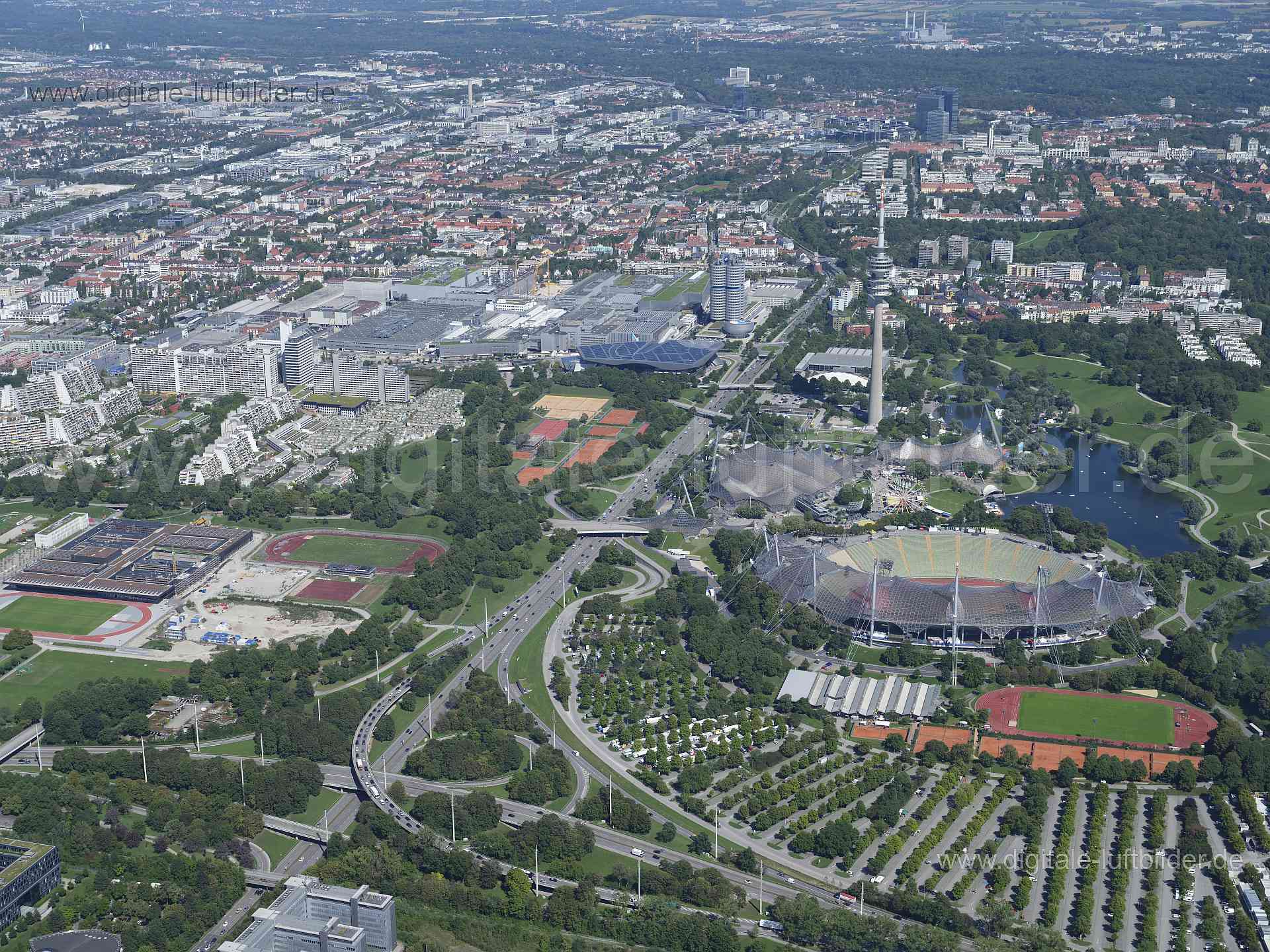 Titel: Olympiapark, Bildnummer: f513350, Ort / Stadt: München, (Land)Kreis: kreisfreie Stadt München, Regierungsbezirk: Oberbayern, Bundesland: Bayern, Aufnahmedatum: 11.08.2023, Schlagwörter: Deutschland, , Olympiapark, Olympiaberg, Olympiaturm, Olympiastadion, Großer Olympiasee, Olympiahalle, Monat: August, Jahreszeit: Sommer, Tageszeit: Vormittag / Mittag, Jahr: 2023, Flug ID: 20230811, Bildstatus: unbearbeitetes Rohbild, Bildabmessung: 11648 x 8736 Pixel, Fotograf & Copyright: Oliver Acker
