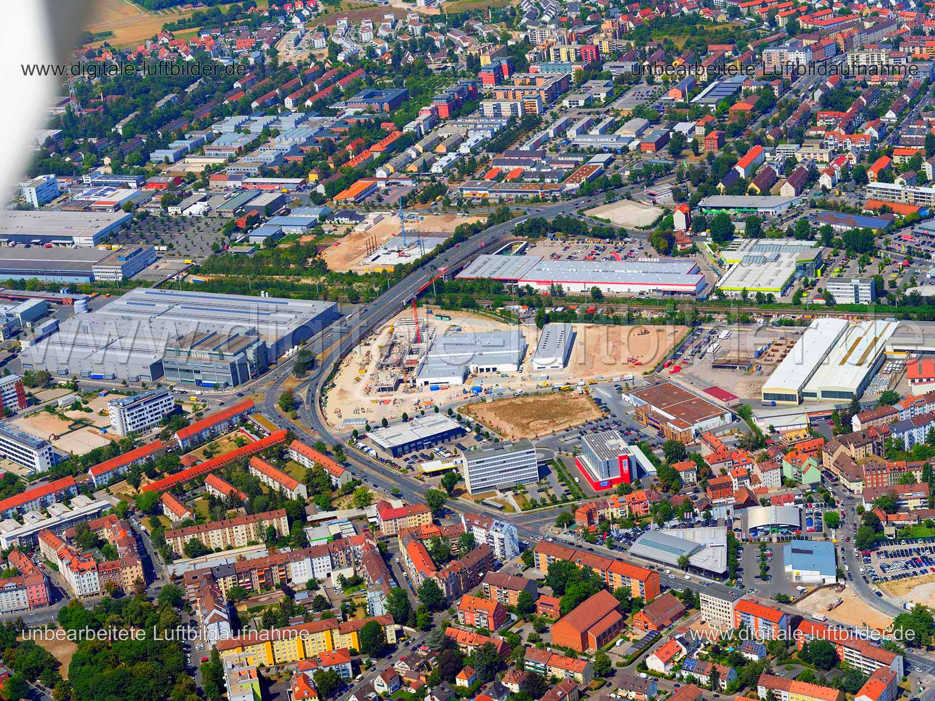 Titel: BMW Niederlassung (Baustelle), Bildnummer: f383120, Ort / Stadt: Nürnberg, (Land)Kreis: kreisfreie Stadt Nürnberg, Regierungsbezirk: Mittelfranken, Bundesland: Bayern, Aufnahmedatum: 01.08.2020, Schlagwörter: Luftbild, Luftbilder, Luftbildfotografie, Luftaufnahme, Luftbildaufnahme, Luftfoto, Vogelperspektive, Vogelansicht, Deutschland, Schräg- und Senkrecht-Luftaufnahmen, Orthofotografie, 90441, Nürnberg, Adalbertstraße, Eythstraße, Hansastraße, Gustav-Adolf-Straße, Schweinauer Hauptstraß