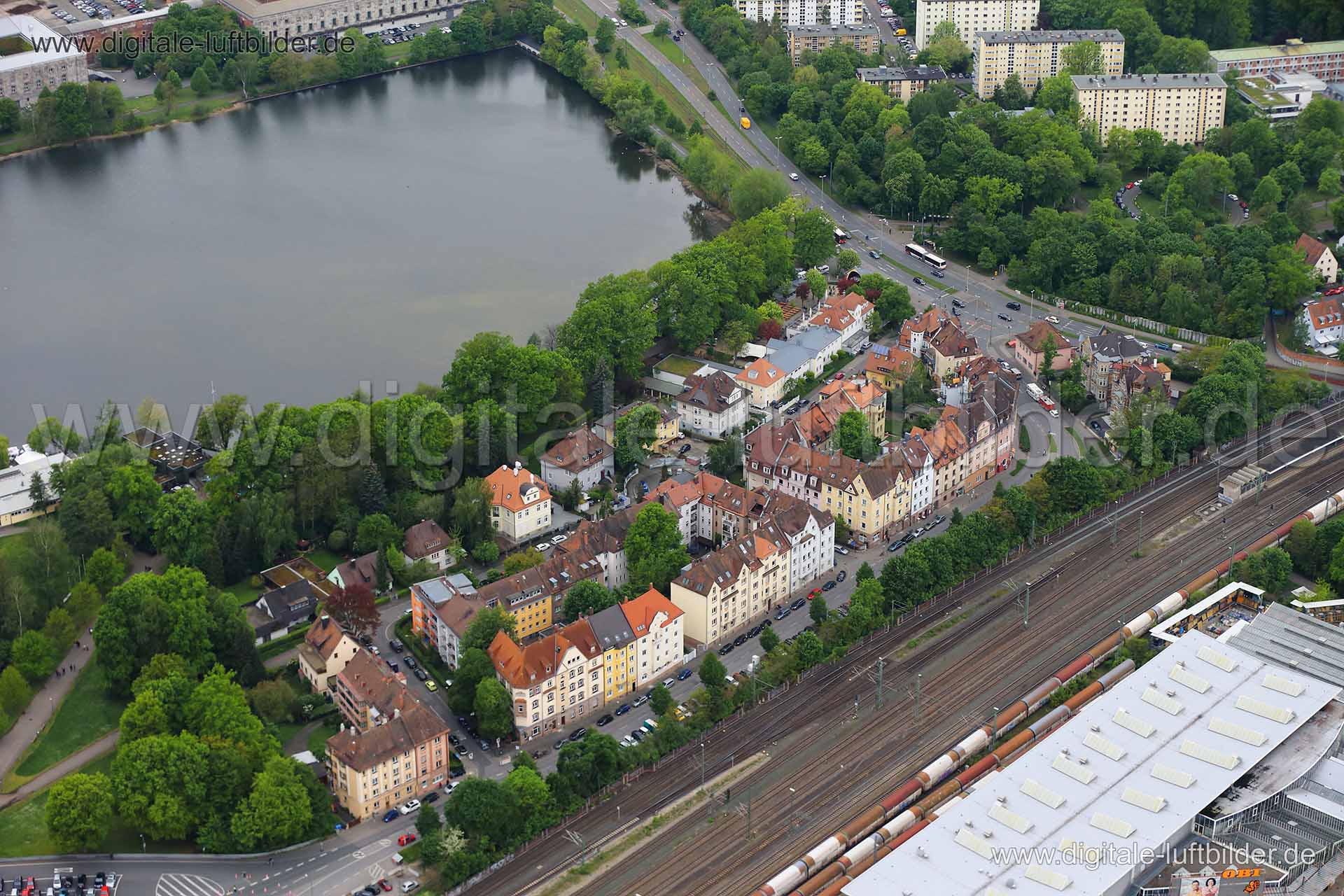 Titel: Herzogstraße, Bildnummer: c105380, Ort / Stadt: Nürnberg, (Land)Kreis: kreisfreie Stadt Nürnberg, Regierungsbezirk: Mittelfranken, Bundesland: Bayern, Aufnahmedatum: 03.05.2014, Schlagwörter: Luftbild, Luftbilder, Luftbildfotografie, Luftaufnahme, Luftbildaufnahme, Luftfoto, Vogelperspektive, Vogelansicht, Deutschland, Schräg- und Senkrecht-Luftaufnahmen, Orthofotografie, Herzogstraße, Dutzendteich, Uzstraße, Seumestraße, Hagedornstraße, Bayernstraße, Monat: Mai, Jahreszeit: Sommer, Tages