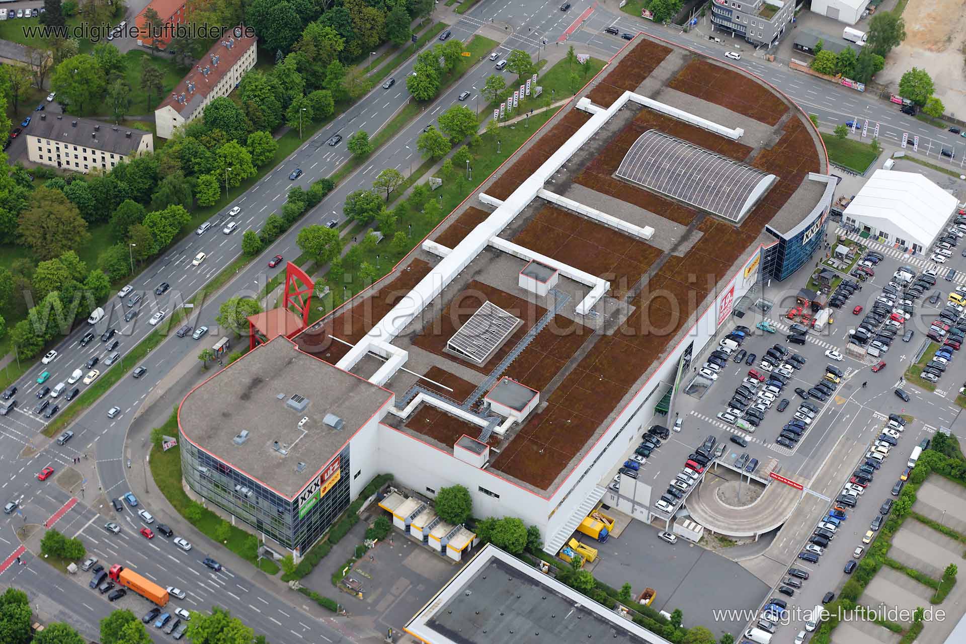 Titel: Möbelhaus XXXLutz, Bildnummer: c106740, Ort / Stadt: Nürnberg, (Land)Kreis: kreisfreie Stadt Nürnberg, Regierungsbezirk: Mittelfranken, Bundesland: Bayern, Aufnahmedatum: 03.05.2014, Schlagwörter: Luftbild, Luftbilder, Luftbildfotografie, Luftaufnahme, Luftbildaufnahme, Luftfoto, Vogelperspektive, Vogelansicht, Deutschland, Schräg- und Senkrecht-Luftaufnahmen, Orthofotografie, Herbst, Herbstaufnahme, Oktober, Möbelhaus XXXLutz, Münchener Straße, Frankenstraße, Bayernstraße, Ingolstädter S