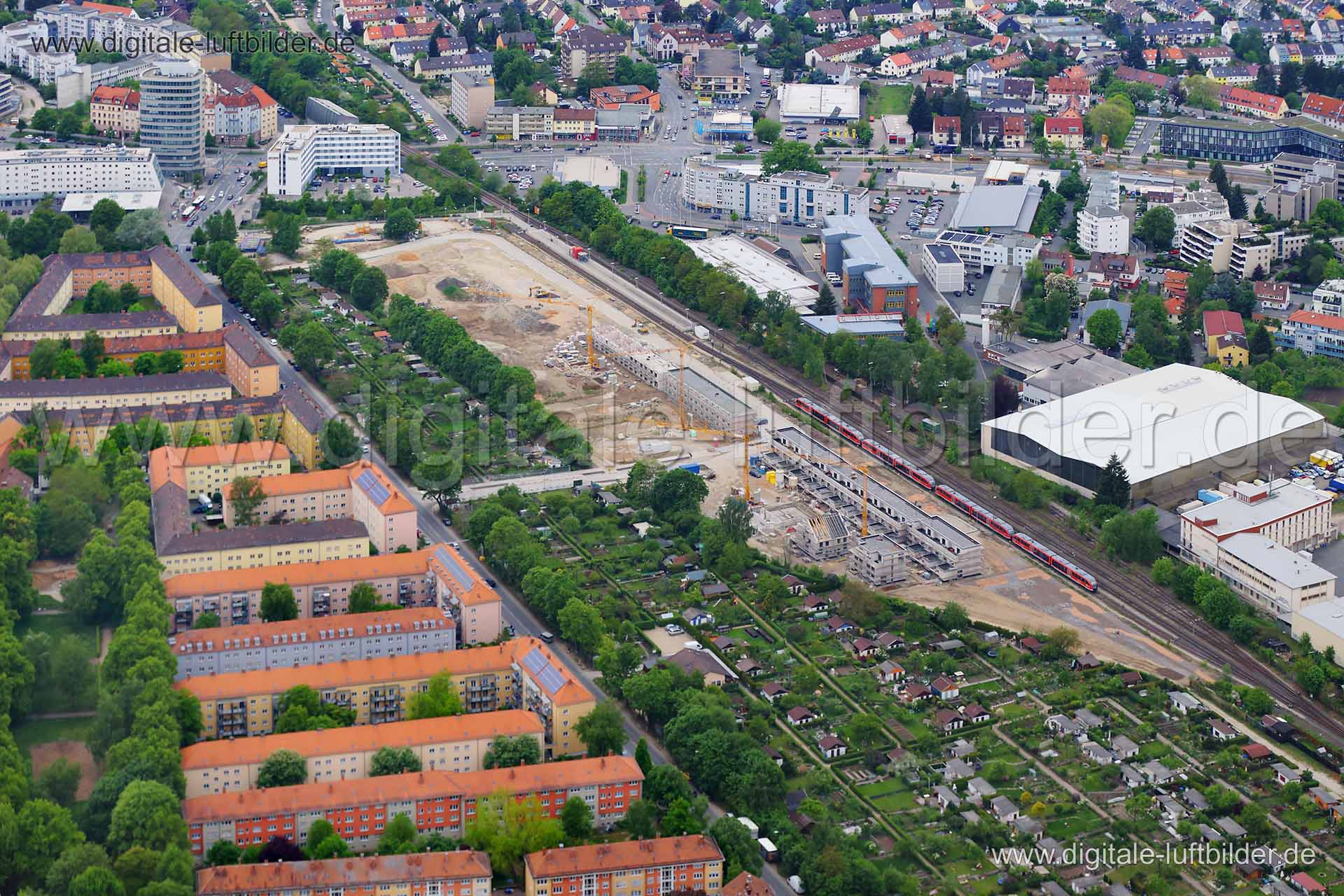 Titel: Nordostbahnhof, Bildnummer: c107770, Ort / Stadt: Nürnberg, (Land)Kreis: kreisfreie Stadt Nürnberg, Regierungsbezirk: Mittelfranken, Bundesland: Bayern, Aufnahmedatum: 03.05.2014, Schlagwörter: Luftbild, Luftbilder, Luftbildfotografie, Luftaufnahme, Luftbildaufnahme, Luftfoto, Vogelperspektive, Vogelansicht, Deutschland, Schräg- und Senkrecht-Luftaufnahmen, Orthofotografie, Nordostbahnhof, Kieslingstraße, Großbaustelle, Baustelle, Gräfenbergbahn, Leipziger Platz, Gewerbeflächen & Gewerbei