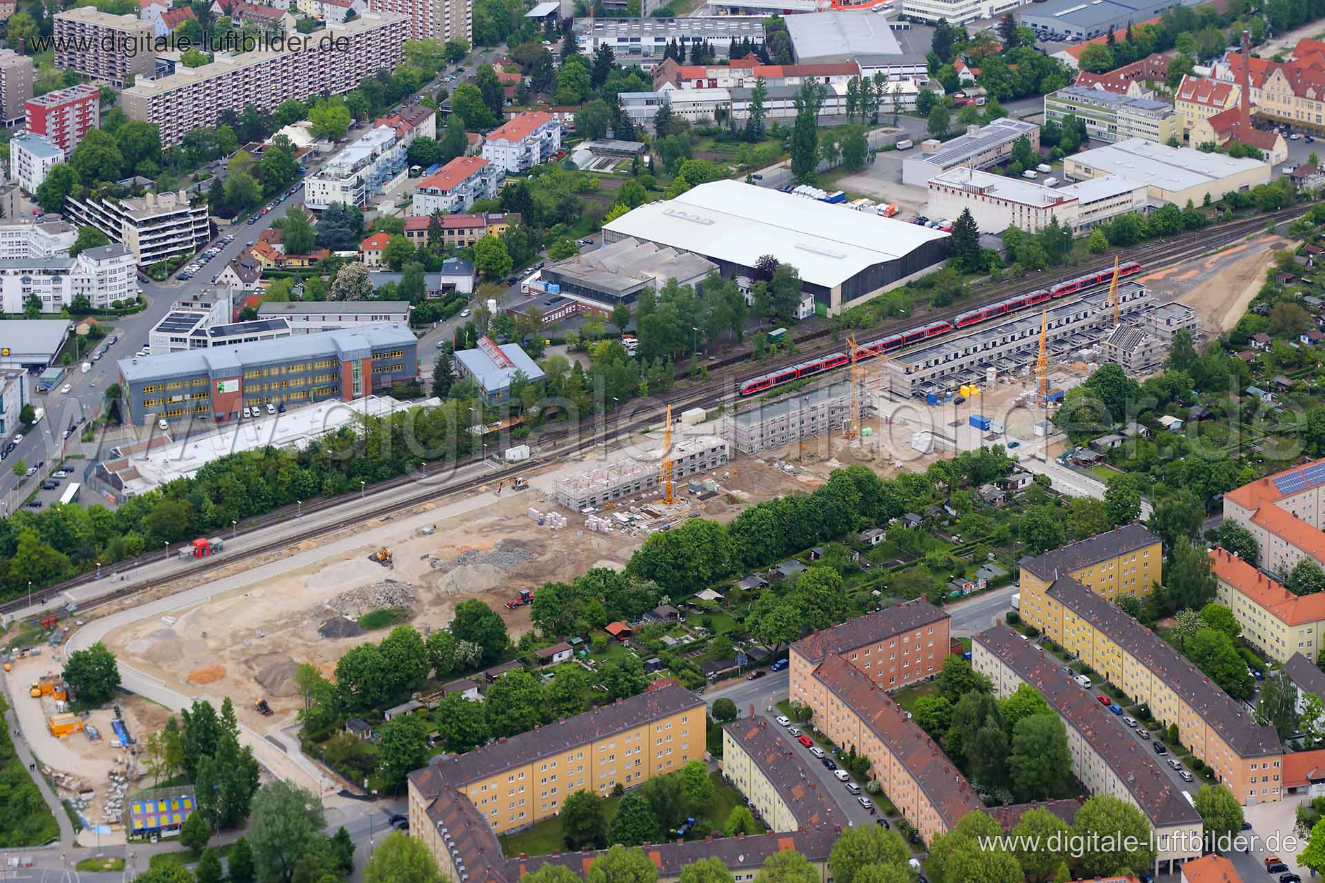 Titel: Nordostbahnhof - Kieslingstraße, Bildnummer: c107620, Ort / Stadt: Nürnberg, (Land)Kreis: kreisfreie Stadt Nürnberg, Regierungsbezirk: Mittelfranken, Bundesland: Bayern, Aufnahmedatum: 03.05.2014, Schlagwörter: Luftbild, Luftbilder, Luftbildfotografie, Luftaufnahme, Luftbildaufnahme, Luftfoto, Vogelperspektive, Vogelansicht, Deutschland, Schräg- und Senkrecht-Luftaufnahmen, Orthofotografie, Nordostbahnhof, Kieslingstraße, Großbaustelle, Baustelle, Gräfenbergbahn, Nordostbahnhof - Kiesling